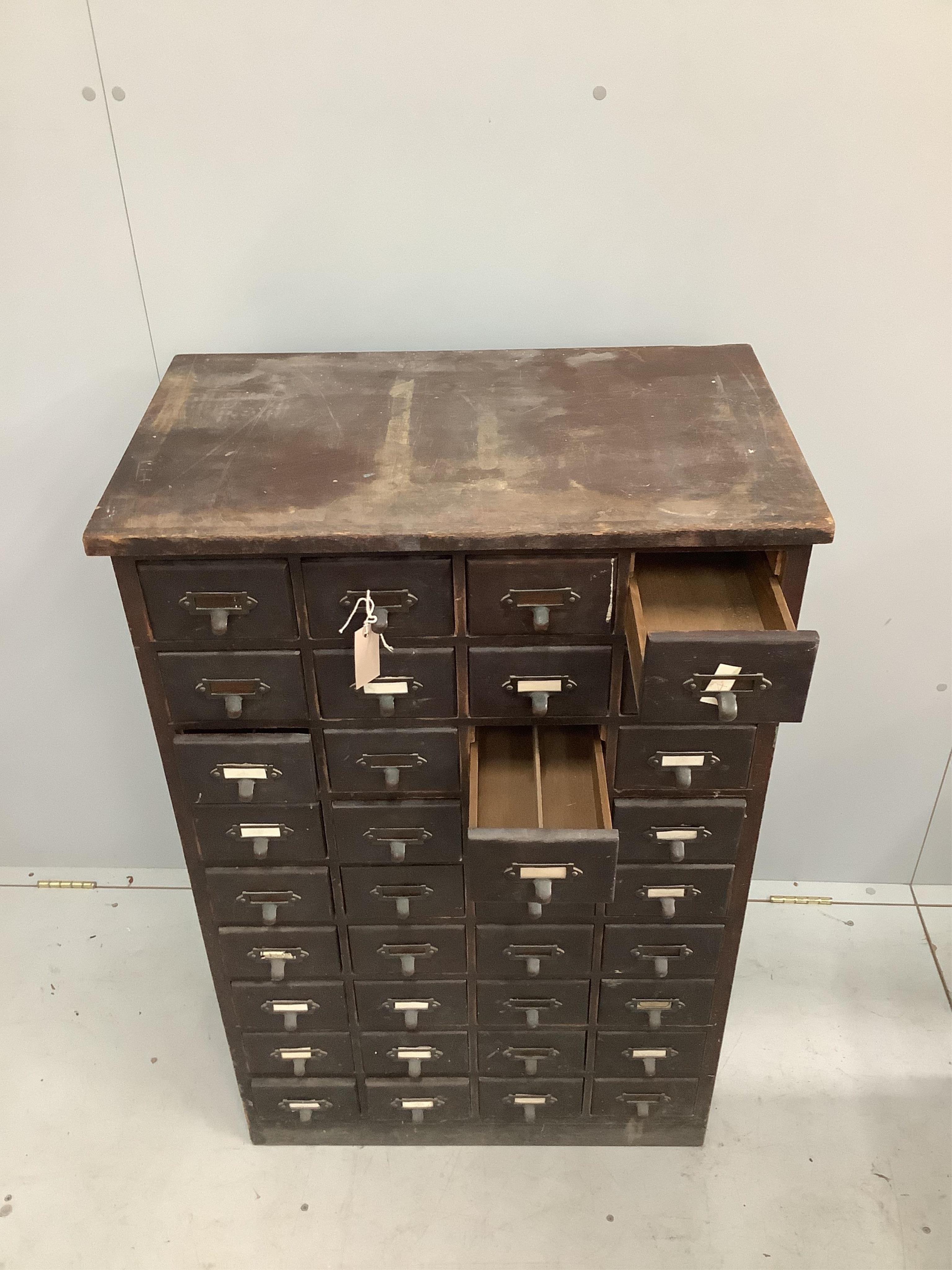 An early 20th century thirty six drawer filing cabinet, width 70cm, depth 42cm, height 108cm. Condition - fair